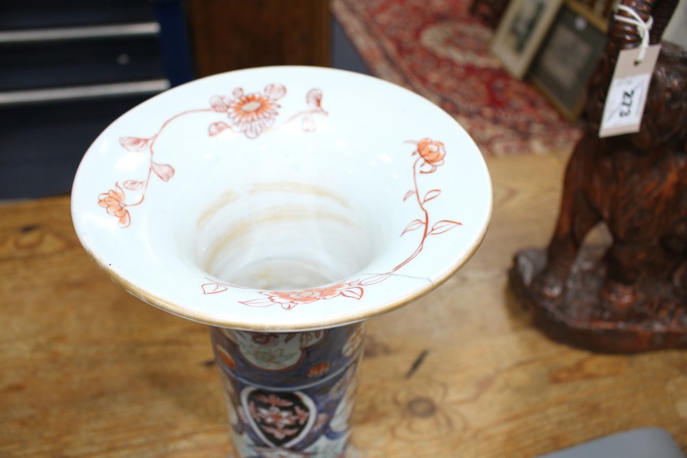 A near pair of Imari trumpet vases, decorated with birds and flowers, height 39.5cm
